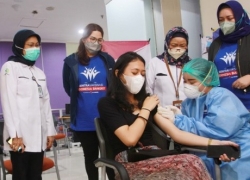Vaksinasi Covid XL Axiata di Medan Usai